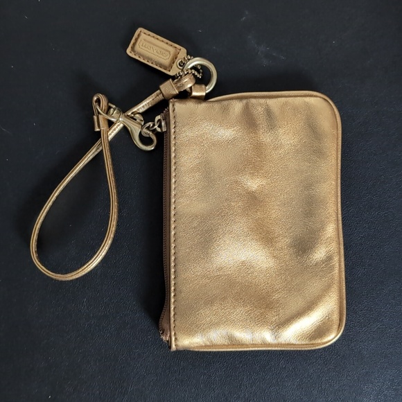 Small gold coach wristlet/clutch - Picture 3 of 3